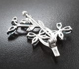 Изысканная серебряная брошь с голубыми топазами