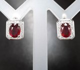 Эффектные серебряные серьги с рубинами