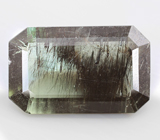 Коллекционный перидот с плотным включением рутила 4,89 карата