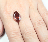 Крупный красно-оранжевый турмалин 6,17 карата 