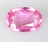 "Неоновая" пурпурно-розовая шпинель 0,61 карата 