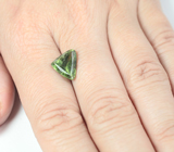 Перидот с включением рутила 4,4 карата 