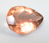 Крупный желтовато-оранжевый турмалин 7,21 карата 