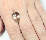 Крупный желтовато-оранжевый турмалин 7,21 карата 