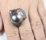 Крупная черная морская жемчужина барокко 55,83 карата! Титановый люстр 