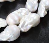 Набор из 15 крупных кремово-белых морских жемчужин на нити 498,12 карата 