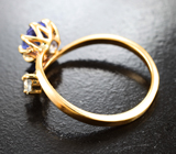 Золотое кольцо с ярким насыщенным танзанитом 0,82 карата и бесцветным топазом Золото