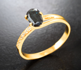 Золотое кольцо с редким насыщенным синим гранатом с александритовой сменой цвета 1,14 карата и бесцветными цирконами