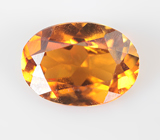 Оранжевато-желтый турмалин 0,56 карата 