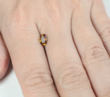 Оранжевато-желтый турмалин 0,56 карата 