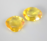 Пара ярко-желтых сапфиров авторской огранки 1,3 карата 