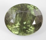 Коллекционный перидот с включениями рутила 5,89 карата 