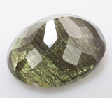 Коллекционный перидот с включениями рутила 5,89 карата