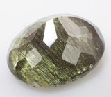 Коллекционный перидот с включениями рутила 5,89 карата 