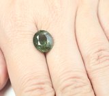 Коллекционный перидот с включениями рутила 5,89 карата 