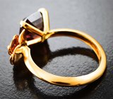 Золотое кольцо с крупным красновато-оранжевым 4,71 карата и бесцветным цирконами Золото