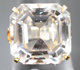 Массивное золотое кольцо с крупным необлагороженным империал топазом 26,7 карата и лейкосапфирами Золото