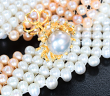 Массивное стильное колье с жемчугом 893,39 карата и застежкой-закруткой из желтого золота 585 пробы с бриллиантами