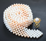 Массивное стильное колье с жемчугом 893,39 карата и застежкой-закруткой из желтого золота 585 пробы с бриллиантами