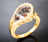 Массивное золотое кольцо с крупным цирконом падпараджа 4,97 карата и бесцветными цирконами Золото