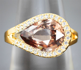 Массивное золотое кольцо с крупным цирконом падпараджа 4,97 карата и бесцветными цирконами Золото