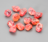 Набор из 13 красных и оранжевых сапфиров 4,18 карата