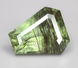 Перидот с включениями рутила авторской огранки 3,11 карата