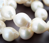 Набор из 25 крупных кремово-белых морских жемчужин барокко на нити 499,55 карата