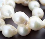 Набор из 25 крупных кремово-белых морских жемчужин барокко на нити 499,55 карата 