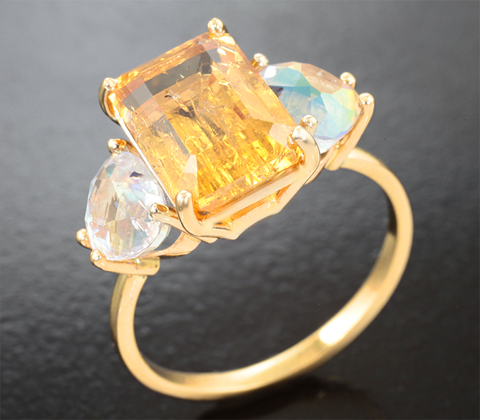 Кольцо с ярко-желтым топазом 5,81 карата и ограненным лунным камнем