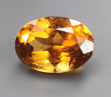 Оранжевато-желтый турмалин 0,7 карата 
