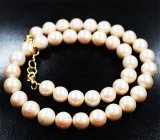 Золотое колье с крупным золотисто-кремовым морским жемчугом барокко 252,9 карата