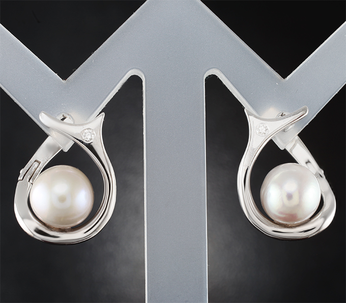 Объемные золотые серьги с морским жемчугом 6,97 карата и бриллиантами