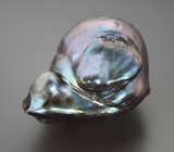 Крупная черная морская жемчужина барокко 39,46 карата! Титановый люстр