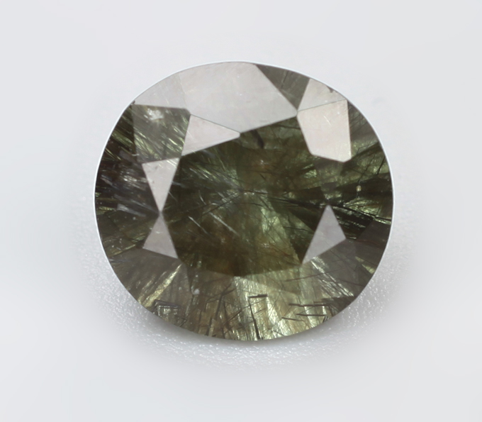 Перидот с включениями рутила 2,34 карата