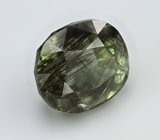 Перидот с включениями рутила 4,17 карата 