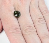 Перидот с включениями рутила 4,17 карата 