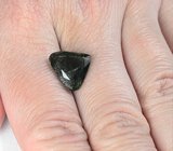 Перидот с включениями рутила 5,44 карата 