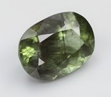 Перидот с включениями рутила 6,53 карата 