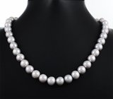 Массивное золотое колье с отборным крупным серебристым морским жемчугом барокко 348 карата