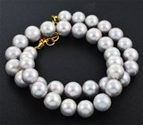 Массивное золотое колье с отборным крупным серебристым морским жемчугом барокко 348 карата