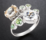 Кольцо с редким данбуритом 1,59 карата, чистейшими цирконами «шампань» и демантоидами гранатами  Золото