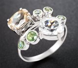 Кольцо с редким данбуритом 1,59 карата, чистейшими цирконами «шампань» и демантоидами гранатами  Золото