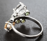 Кольцо с редким данбуритом 1,59 карата, чистейшими цирконами «шампань» и демантоидами гранатами  Золото