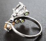 Кольцо с редким данбуритом 1,59 карата, чистейшими цирконами «шампань» и демантоидами гранатами  Золото