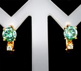 Золотые серьги с зеленовато-голубыми и бесцветными муассанитами 1,93 карата