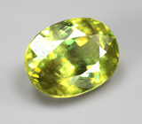 Крупный желтовато-зеленый сфен 3,91 карата 