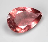 Крупный оранжевато-красный турмалин 6,99 карата 