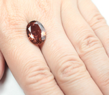 Крупный оранжевый турмалин 6,31 карата 