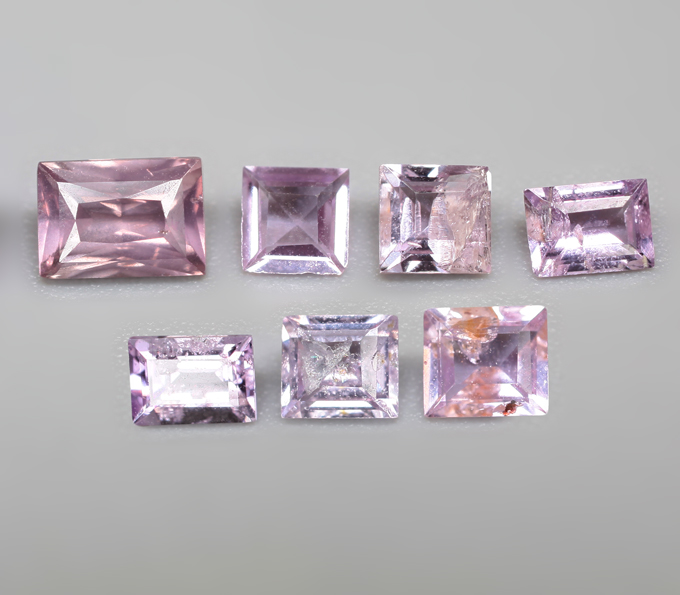 Набор из 7 розовато-пурпурных сапфиров 1,4 карата